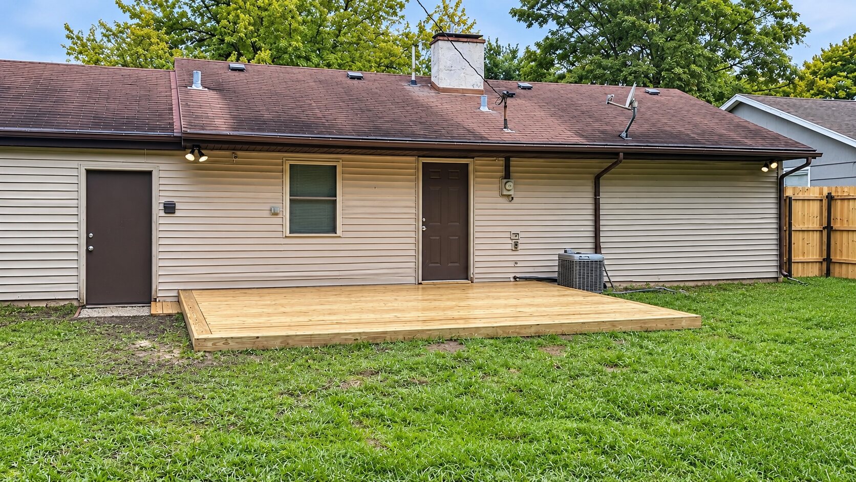 New low-profile wood deck completed by Inspired Contracting